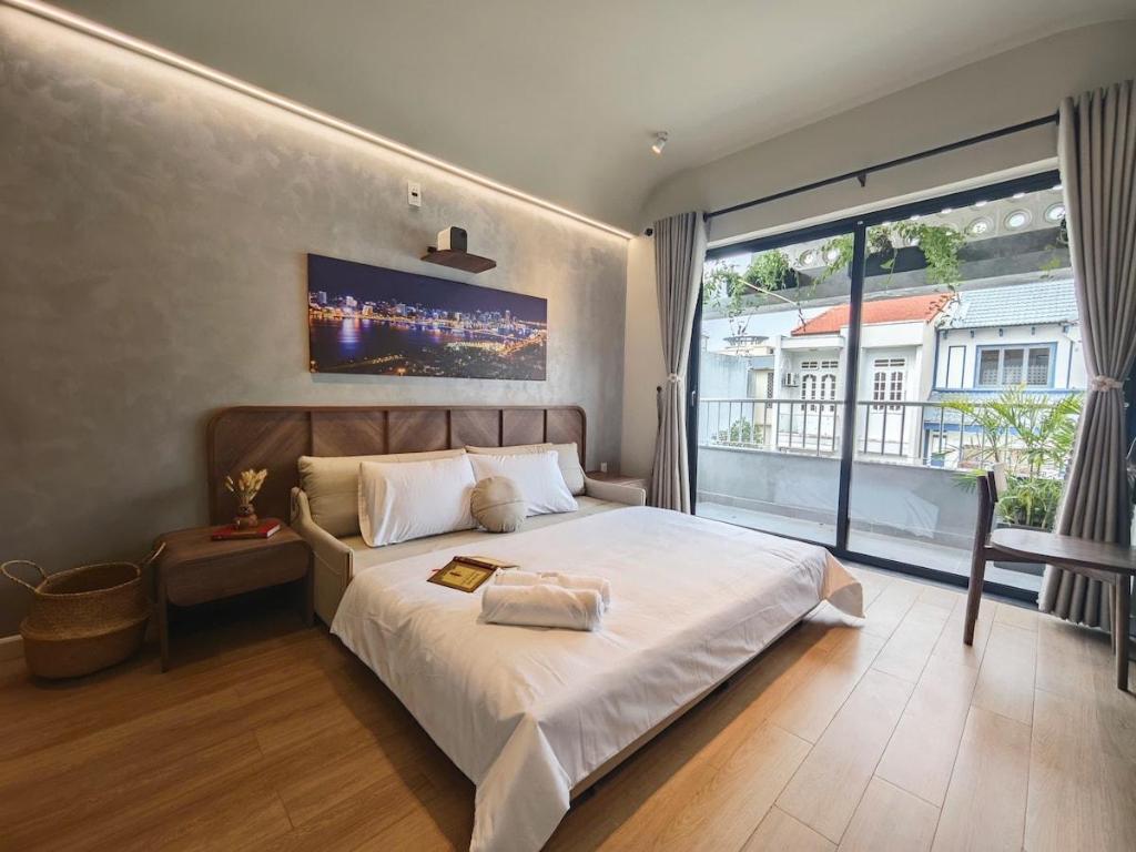 ダナンのGomiHouse 4BRs 5 minute to LOTTE with jacuzzi pool — 写真2